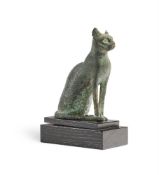 AN EGYPTIAN BRONZE FIGURE OF A SEATED CAT, LATE PERIOD, CIRCA 664-525 B.C