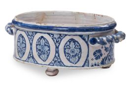 A FRENCH FAIENCE TWO HANDLED JARDINIERE OR CISTERN PROBABLY ROUEN, 18TH CENTURY