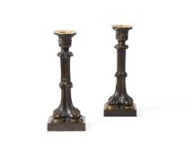 A PAIR OF WILLIAM IV BRONZE CANDLESTICKS, CIRCA 1830-1840