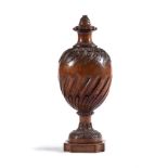 AN EARLY GEORGE III CARVED URN FINIAL ATTRIBUTED TO JAMES GIBBS, CIRCA 1760-1780
