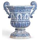 A ROUEN FAIENCE TWO-HANDLED URN, 18TH CENTURY