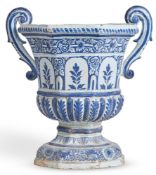 A ROUEN FAIENCE TWO-HANDLED URN, 18TH CENTURY