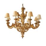 A CARVED GILTWOOD EIGHT LIGHT CHANDELIER FRENCH, AFTER ANDRE-CHARLES BOULLE, EARLY 18TH CENTURY