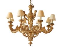 A CARVED GILTWOOD EIGHT LIGHT CHANDELIER FRENCH, AFTER ANDRE-CHARLES BOULLE, EARLY 18TH CENTURY