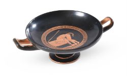 AN ATTIC RED-FIGURE POTTERY KYLIX, PROBABLY THE PAINTER OF ATHENS 1237, CIRCA 470-460 B.C.