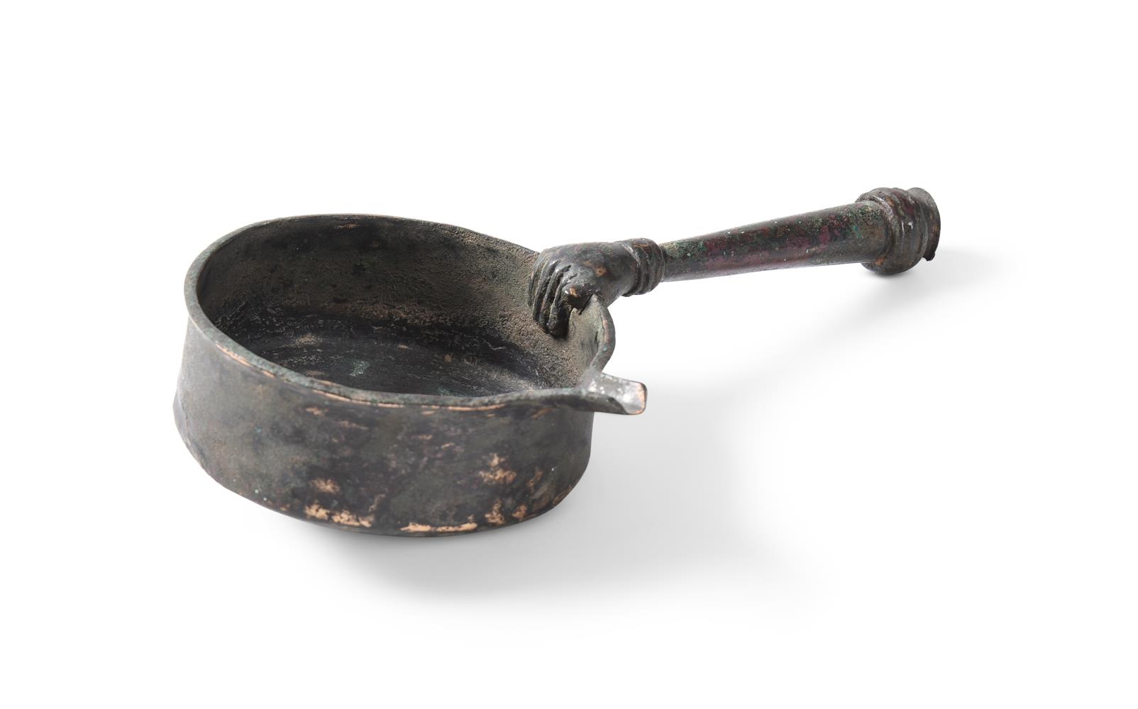 A ROMAN BRONZE SKILLET CIRCA 1ST-3RD CENTURY A.D.