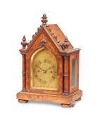 AN EARLY VICTORIAN CARVED AND BURR OAK SMALL MANTEL CLOCK BY VINER, LONDON, CIRCA 1841
