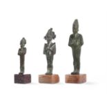 THREE EGYPTIAN BRONZE FIGURES OF OSIRIS, LATE PERIOD, AFTER 600 B.C.