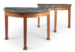A PAIR OF VICTORIAN OAK SEMI ELLIPTICAL SIDE TABLES PROBABLY MADE ON THE WYNYARD PARK ESTATE