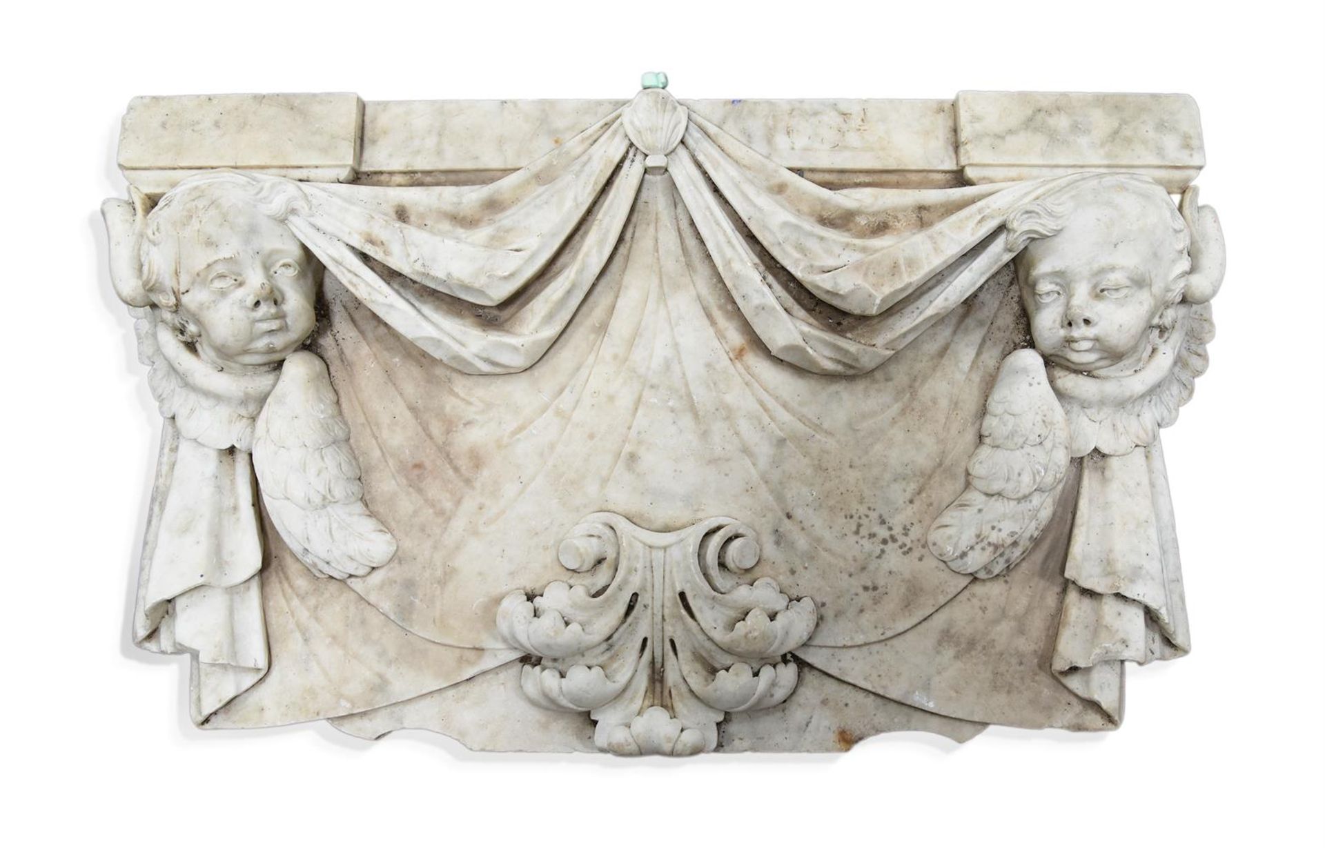 A GEORGE I WHITE MARBLE FRIEZE CARVED WITH PUTTI MASKS AND SWAGS, EARLY 18TH CENTURY