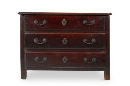 A FRENCH PROVINCIAL CHESTNUT AND WALNUT COMMODE, MID 18TH CENTURY