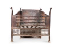 AN ARTS AND CRAFTS STEEL AND CAST IRON FIRE GRATE, EARLY 20TH CENTURY