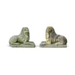 A PAIR OF ITALIAN CARVED STONE RECUMBENT LIONS, LATE 19TH CENTURY