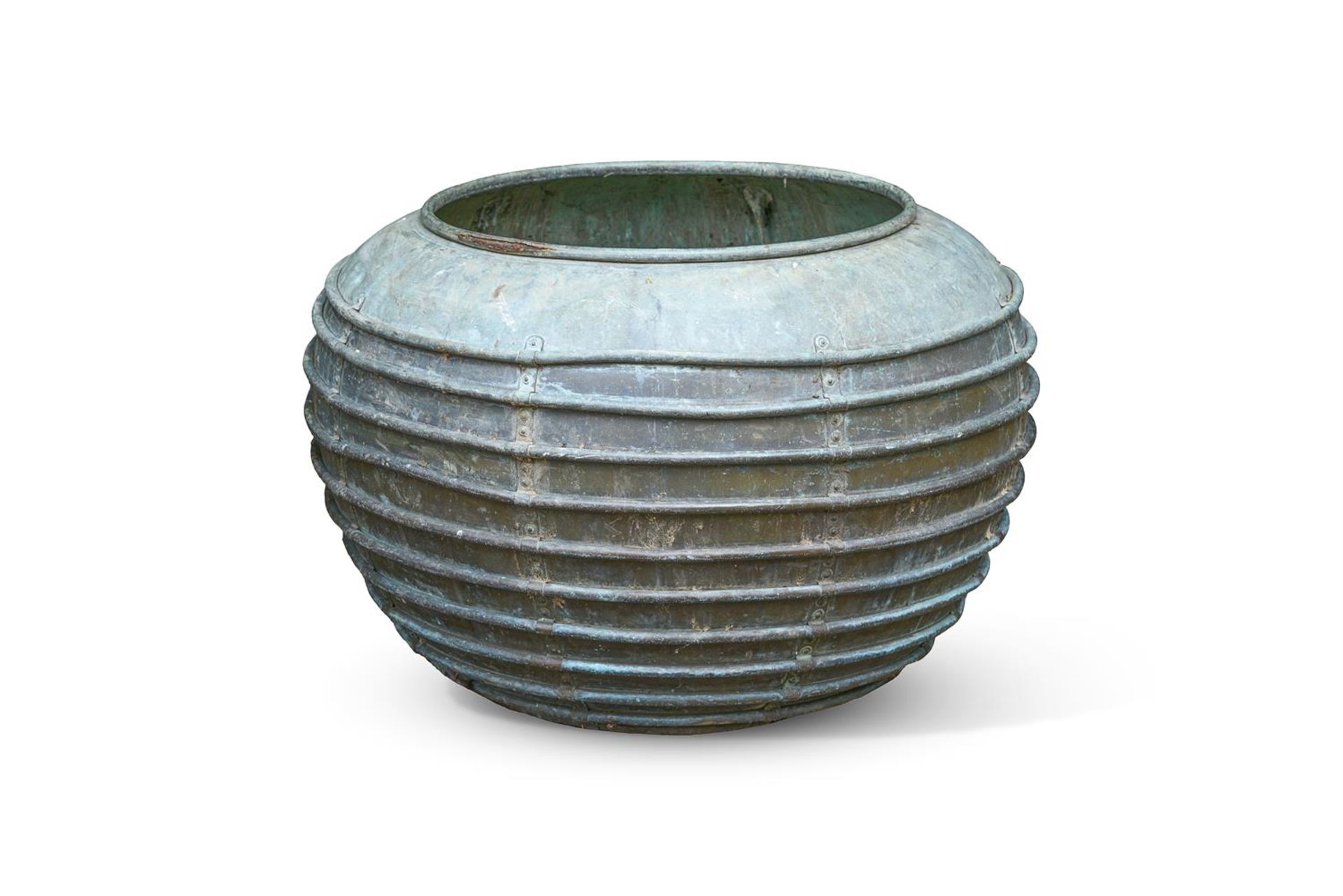 A LARGE RIBBED COPPER PLANTER, CIRCA 1910