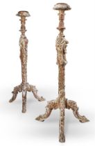 A PAIR OF CARVED POPLAR GILTWOOD TORCHERES, ITALIAN OR GERMAN, MID 18TH CENTURY