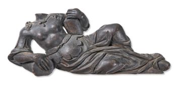 A FRAGMENTARY CARVED WOOD RECLINING FIGURE, PROBABLY 18TH CENTURY