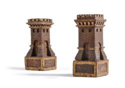 A PAIR OF PARCEL GILT WALNUT MODELS OF CASTELLATED TOWERS, LATE 19TH/EARLY 20TH CENTURY