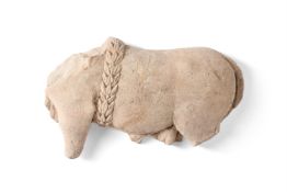 A FRAGMENTARY LIMESTONE RELIEF OF A GARLANDED SACRIFICIAL BULL, POSSIBLY ROMAN