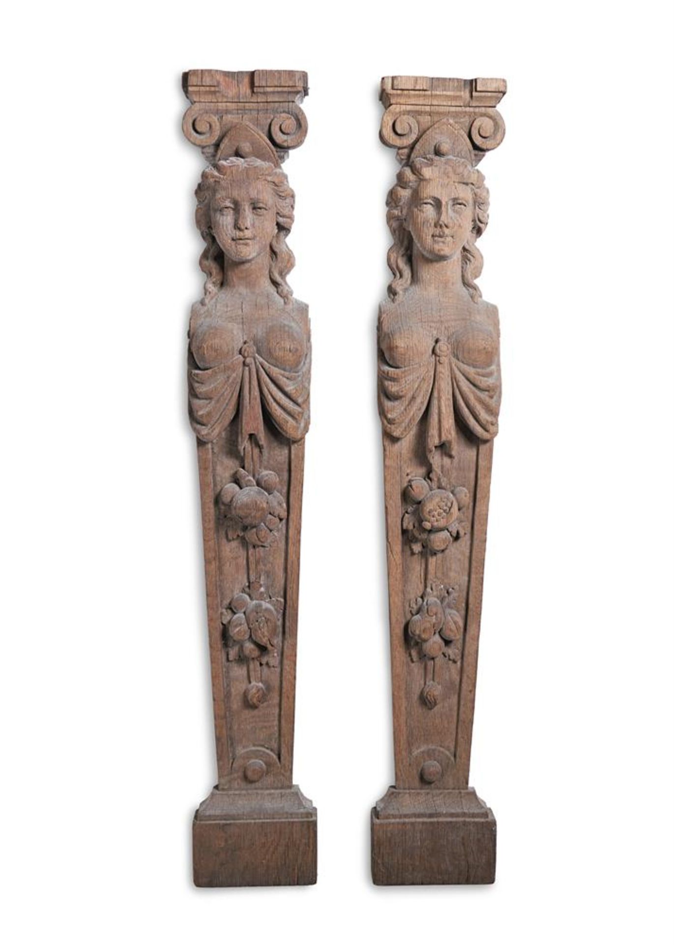 A PAIR OF CARVED OAK HERM PILASTERS, 19TH CENTURY IN THE LATE 17TH CENTURY
