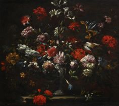 CIRCLE OF MARIO NUZZI (ITALIAN 1603-1673)STILL LIFE OF FLOWERS IN AN URN