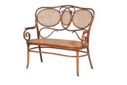 A BENTWOOD AND CANE SETTEE