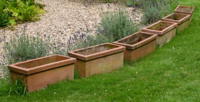 A SET OF SIX RECTANGULAR TERRACOTTA PLANTERS, MODERN