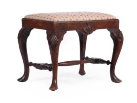 A CARVED MAHOGANY STOOL IN GEORGE II IRISH STYLE