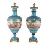 A PAIR OF SEVRES STYLE TURQUOISE GROUND GILT AND 'JEWELLED' GILT METAL MOUNTED VASES AND CROWN-SHAPE