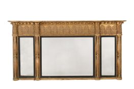 A REGENCY CARVED GILTWOOD AND GESSO OVERMANTEL MIRROR