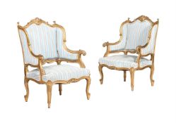 A PAIR OF ITALIAN GILTWOOD AND WATERED SILK UPHOLSTERED ARMCHAIRS
