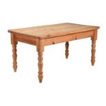 A SCRUBBED PINE REFECTORY TABLE IN VICTORIAN STYLE