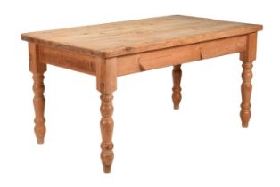 A SCRUBBED PINE REFECTORY TABLE IN VICTORIAN STYLE
