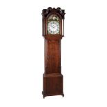 AN OAK AND MAHOGANY LONGCASE CLOCK