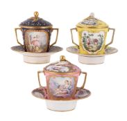 A GROUP OF THREE SEVRES-STYLE TWO-HANDLED ECUELLES
