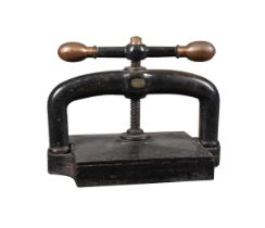 A VICTORIAN CAST IRON BOOKPRESS, BY PATRIDGE & COOPER, LONDON