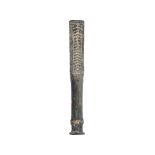 AN ELAMITE BRONZE TRUNCHEON SHAPED MACE HEAD