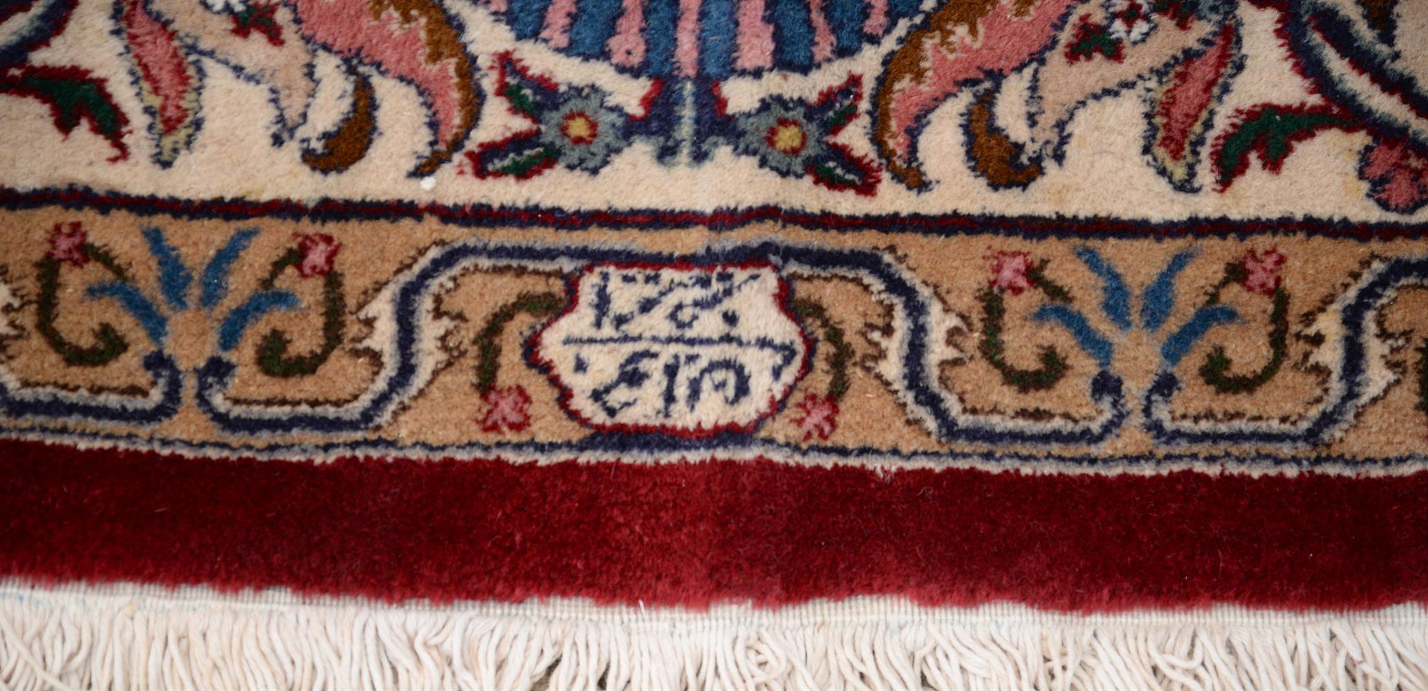 A TABRIZ CARPET, SIGNED BY MASTER WEAVER JAVAN AMIR KHIZ - Image 4 of 4