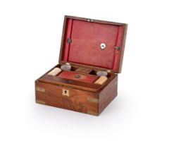 A MAHOGANY AND BRASS MOUNTED WRITING OR DRESSING BOX, BEARING LABEL FOR W.DOBSON, STRAND, LONDON