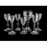 SEVEN VARIOUS PLAIN-STEMMED WINE GLASSES