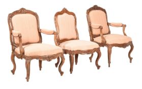 A SET OF THREE VENETIAN WALNUT ARMCHAIRS