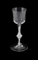 A CENTRALLY-KNOPPED OPAQUE TWIST WINE GLASS