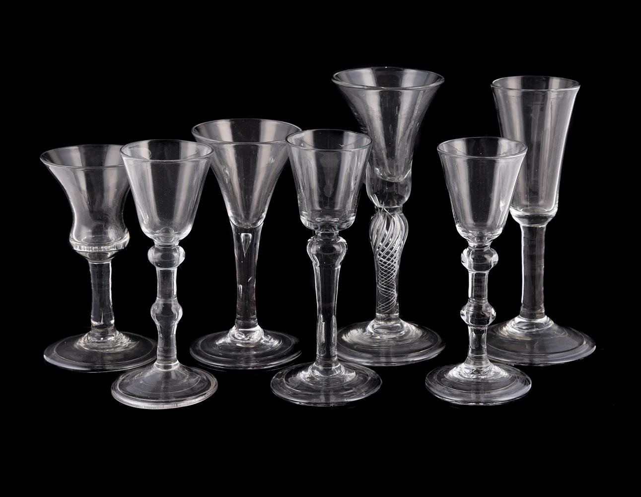 SEVEN VARIOUS PLAIN-STEMMED WINE GLASSES