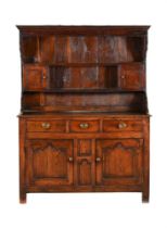 A GEORGE III OAK DRESSER