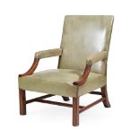 A GEORGE II WALNUT, MAHOGANY AND LEATHER UPHOLSTERED ARMCHAIR