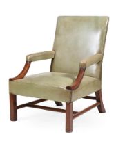 A GEORGE II WALNUT, MAHOGANY AND LEATHER UPHOLSTERED ARMCHAIR