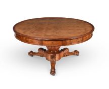A CHARLES X MAHOGANY DRUM LIBRARY TABLE