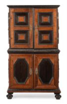 AN UNUSUAL OAK AND EBONISED CABINET, PROBABLY DUTCH OR FLEMISH