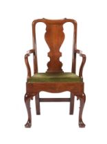 A GEORGE II MAHOGANY ARMCHAIR