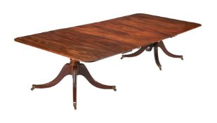 A MAHOGANY TWIN PILLAR DINING TABLE, IN GEORGE III STYLE