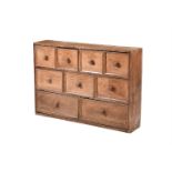 A VICTORIAN PINE CHEST OF NINE DRAWERS